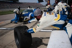 Chase Elliott pit crew grabs wheel
